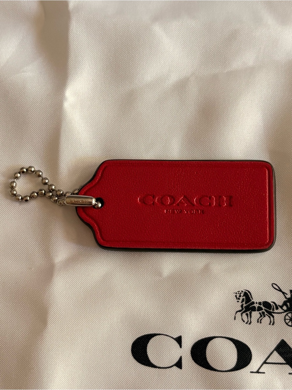Coach hangtag bag charm